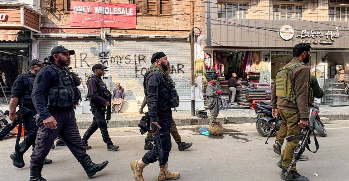 Security personnel stand guard following the arrest of Dr. Adeel (a resident of Wanpora, Kulgam), accused in an interstate and transnational terror module, in Anantnag, Monday, Nov. 10, 2025.  Photo: PTI