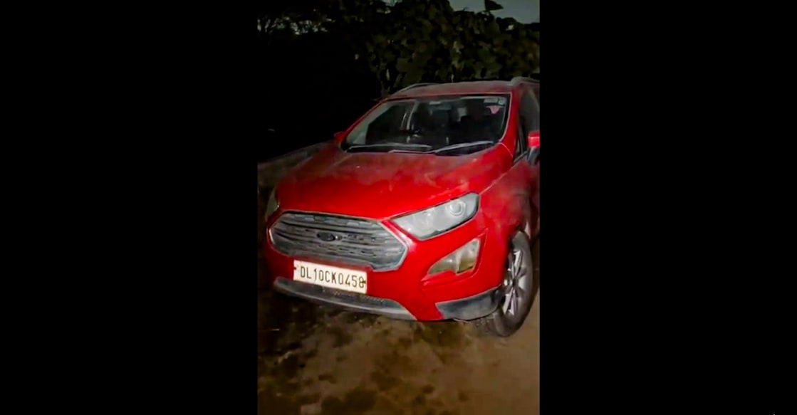 A red Ford EcoSport car, suspected to be linked to the Delhi Red Fort blast case, after being seized from Khandawali, in Faridabad district, Haryana. Photo: PTI