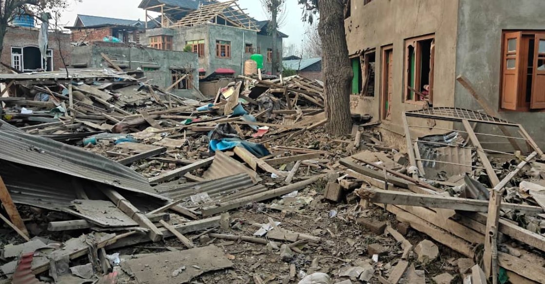 Debris at the site after the house of Dr Umar Nabi, who drove the explosive-laden car involved in the Delhi blast, was demolished by security forces, in Jammu and Kashmir's Pulwama district. Photo: PTI