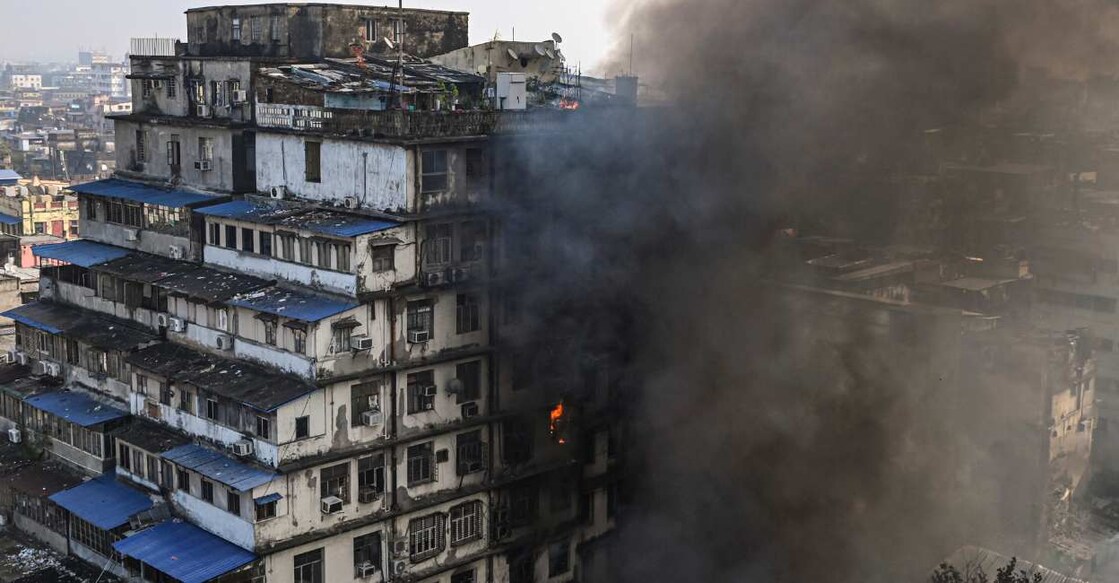 Smoke billows out after a fire broke out in a multi-storey building in Kolkata. Photo: PTI