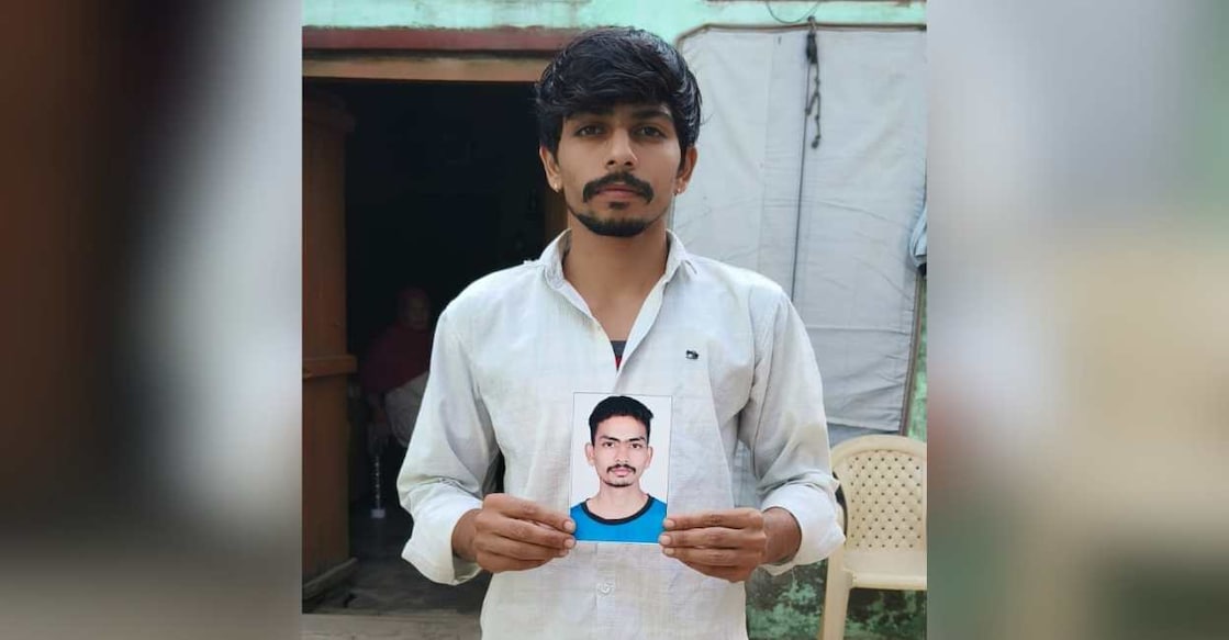 Ashu Punia, Aman's brother, showing picture of Aman. Photo: Special Arrangement