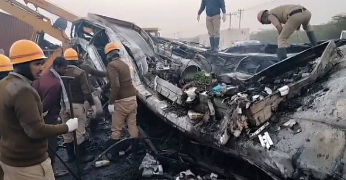 Fire Force and police personnel remove debris of the vehicles that met with the accident in Karnataka's Chitradurga. Photo: PTI