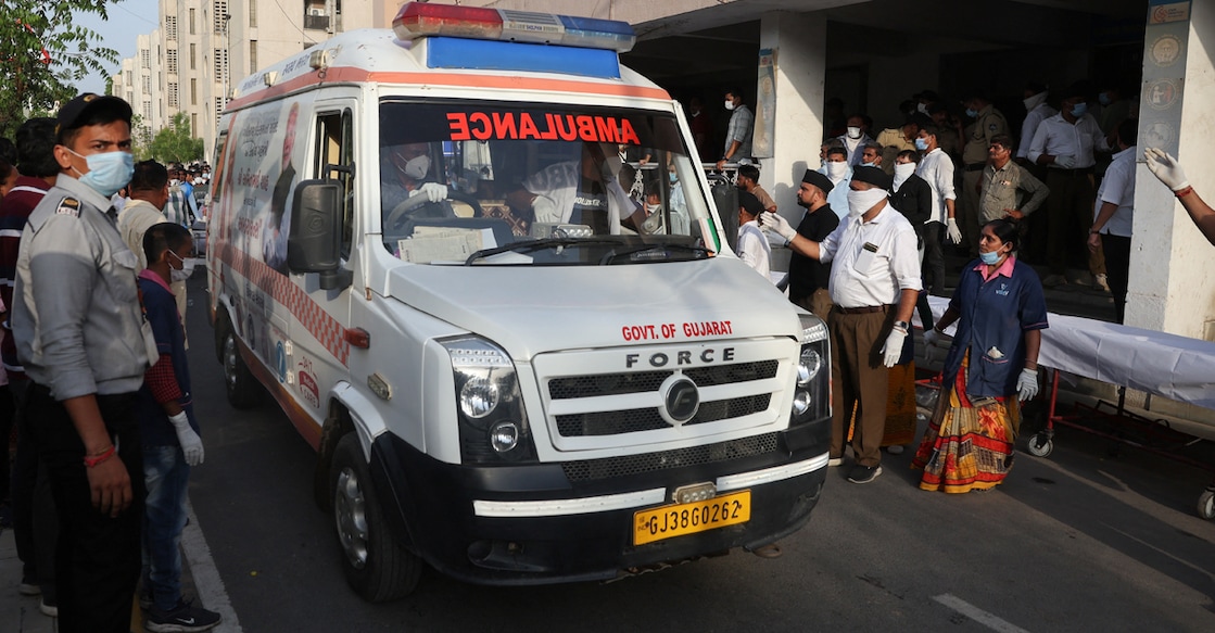 INDIA-CRASH An ambulance carrying the bodies of victims of the Air India Boeing 787 Dreamliner plane crash arrives at the hospital in Ahmedabad, India, June 12, 2025. Photo: Reuters/Amit Dave