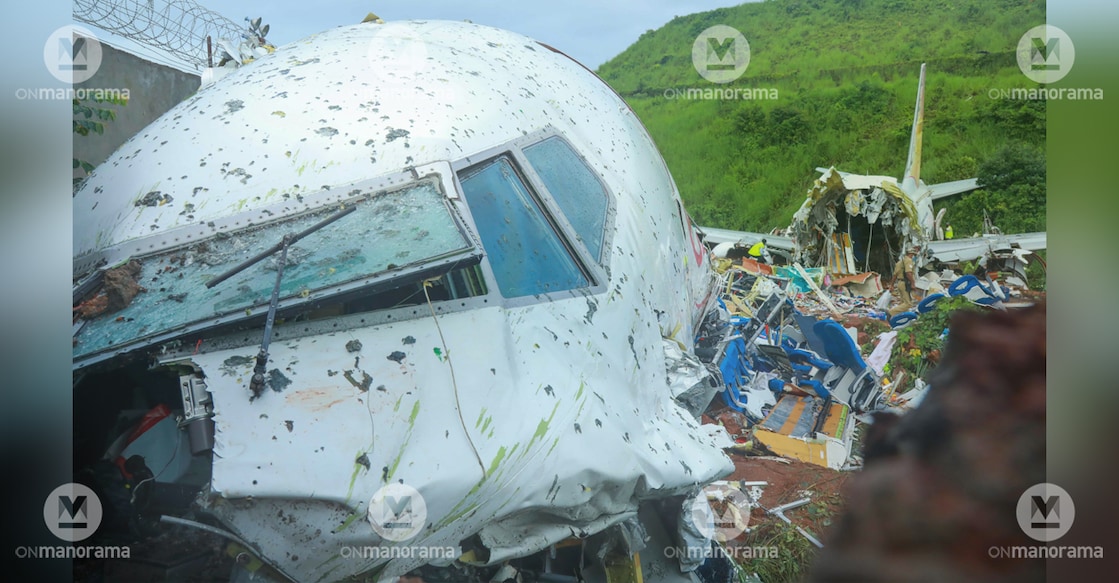 karipur plane crash The wreckage of an Air India Express flight crashed on August 7 after overshooting the runway at the Calicut International Airport in Karipur, Kerala. Photo: Arunchandra Bose/AFP/ Manorama Archives