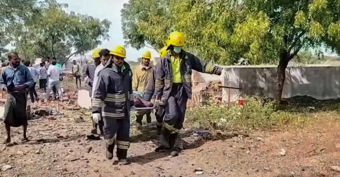 Rescue personnel during a rescue operation after a blast at a firecracker manufacturing factory at Sivakasi. Photo: PTI