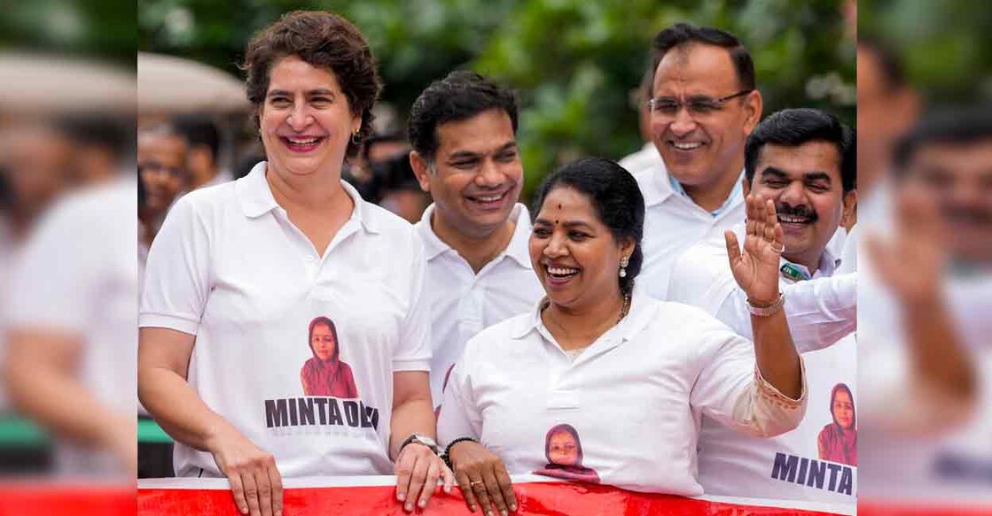 Congress MPs Priyanka Gandhi Vadra and R. Sudha seen wearing T-shirts featuring the name Minta Devi. Photo: PTI
