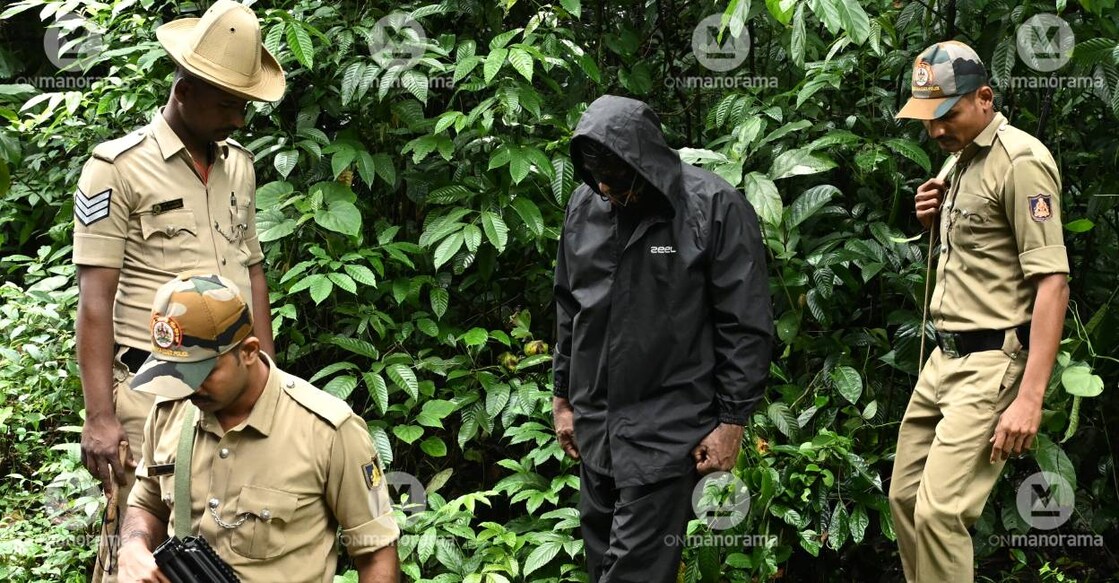 Police take the complainant to exhume bodies from the site in Dharmasthala. Photo: Manorama Archives