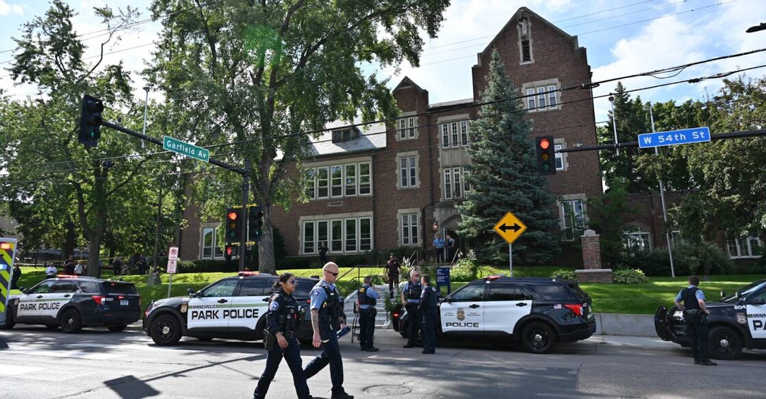 Police and first responders work at the scene of a shooting near Annunciation Church and Catholic School in Minneapolis, Minneosta. Photo: AFP