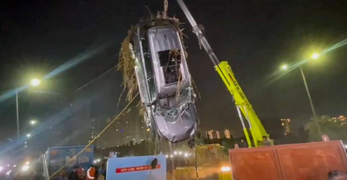 Car belonging to Yuvraj Mehta who died after his car had plunged into a water-filled pit at a construction site, retrieved after a search operation, in Noida. Photo: PTI