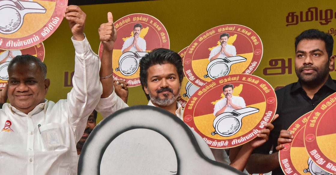Vijay unveils party symbol 'Whistle' at an event held in Mahabalipuram, Tamil Nadu on Sunday. Photo: PTI