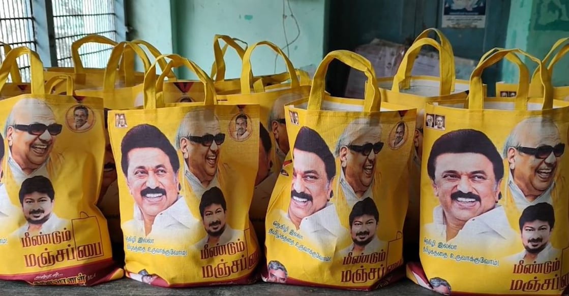 Pongal gift hamper carrying cash, dhoti, saree and other essentials distributed by Tamil Nadu government. Photo: IANS