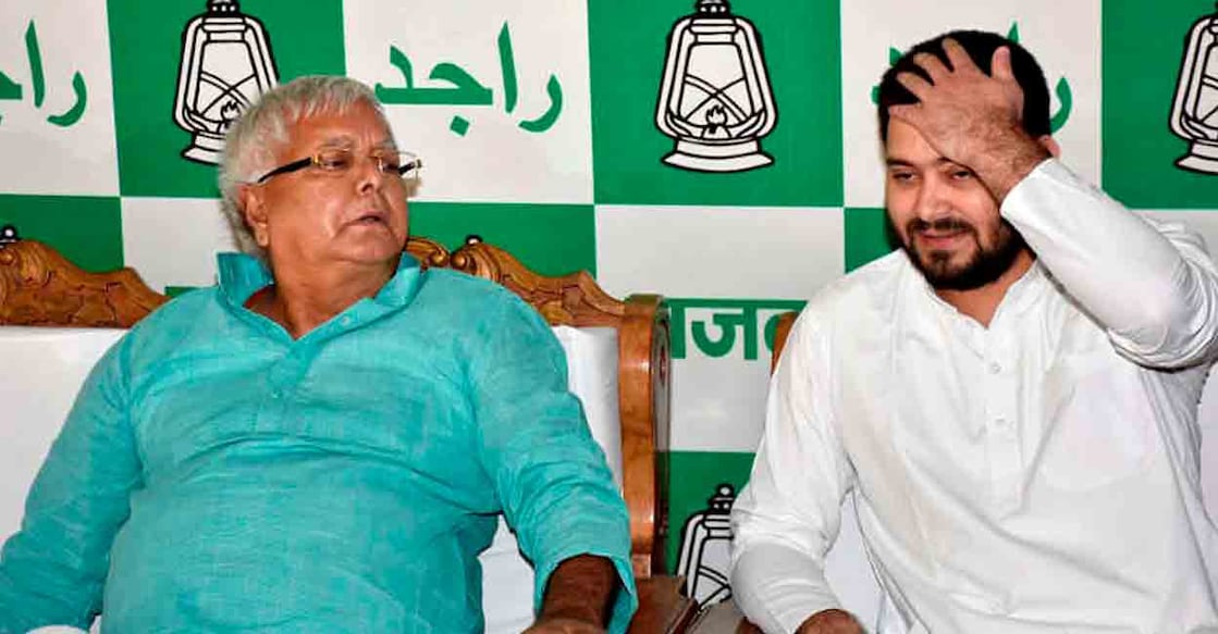 Lalu Prasad Yadav and son Tejaswi Yadav during a press meet in Patna. File photo: PTI