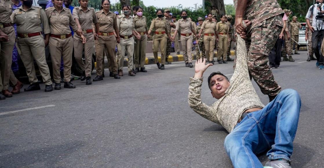 Police personnel detain activists of various student bodies in the Connaught Place area, amid continued calls for demonstrations by the Cockroach Janta Party (CJP) demanding the resignation of Chief Election Commissioner (CEC) Gyanesh Kumar, in New Delhi, Sunday, Oct. 11, 2026. Photo: PTI. 