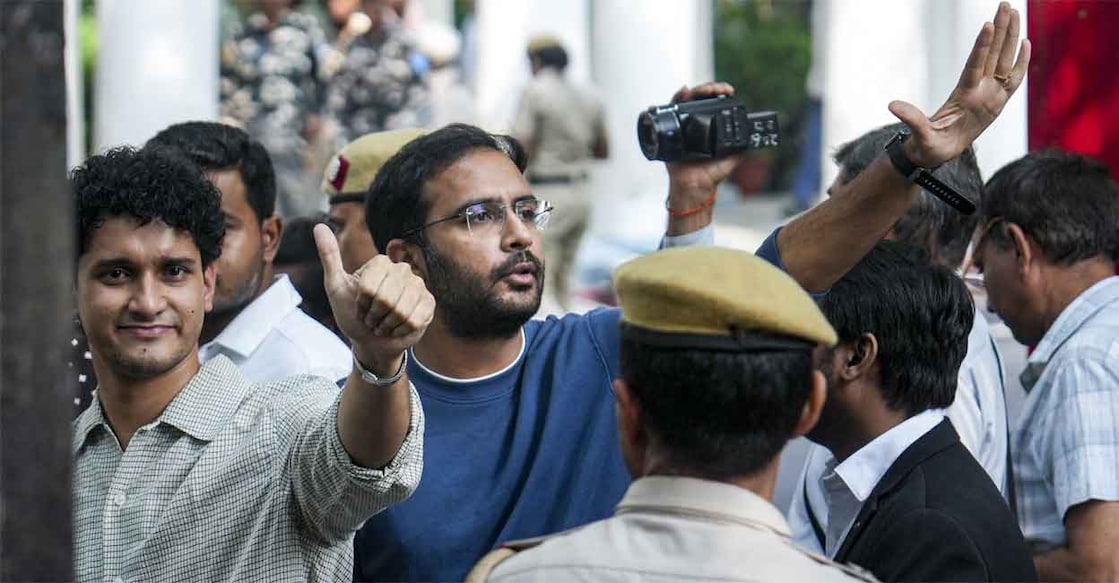 Saurav Das and Ashutosh Ranka arrive at the Parliament Street Police Station regarding permission and security clearance for party demonstrations in New Delhi, Monday, Oct. 12, 2026. Photo: PTI