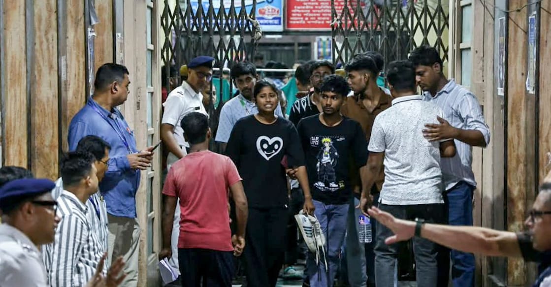 Injured people and relatives arrive at Kolkata Medical College and Hospital following a stampede caused by an exit gate collapse due to heavy crowd pressure at the Chorbagan Sarbojanin Durga Puja pandal, in Kolkata, on Saturday, Oct. 17, 2026. Photo: PTI.