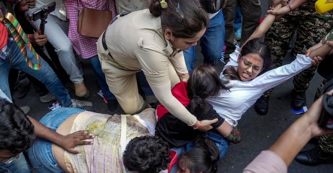 Demonstrators being detained by police personnel during a protest against Chief Election Commissioner (CEC) Gyanesh Kumar, demanding his resignation over the alleged irregularities in the Special Intensive Revision (SIR) of electoral rolls and mass deletion of voters, at Jantar Mantar, in New Delhi, Saturday, Oct. 3, 2026. Photo: PTI. 