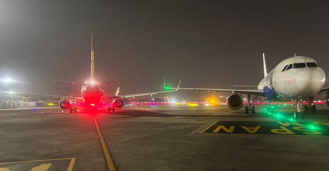 An IndiGo Airbus A320 and an Air India Airbus A320 are seen on the taxiway at Mumbai airport after their wing tips reportedly touched during taxiing, in Mumbai. Photo: PTI