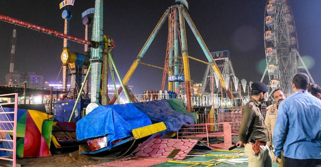 Police personnel at the spot after a swing fell down at Surajkund fair, in Faridabad. Photo: PTI
