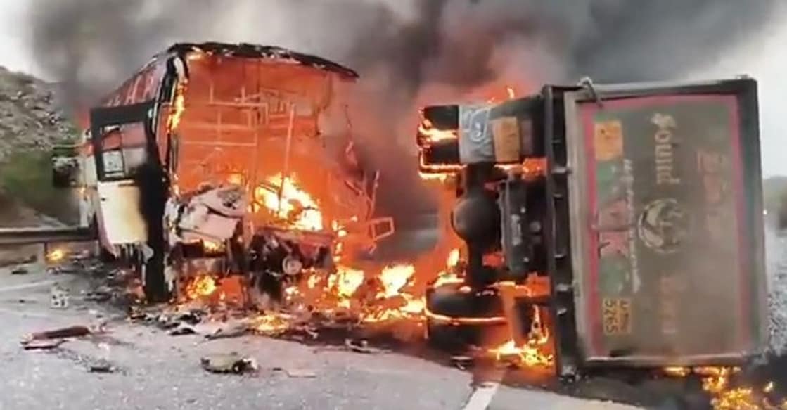 The bus caught on fire after the collision. Photo: IANS