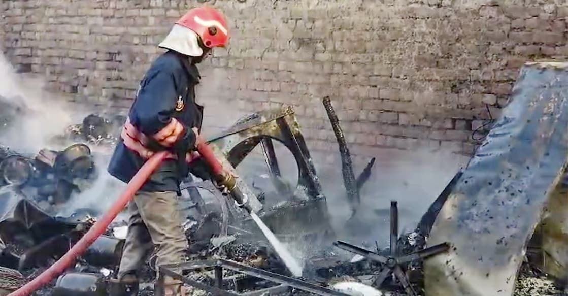 Firefighters at the site after a massive fire broke out in a cluster of shanties, gutting more than 50 huts, in the Rithala area, New Delhi, Thursday, March 5, 2026. Photo: PTI