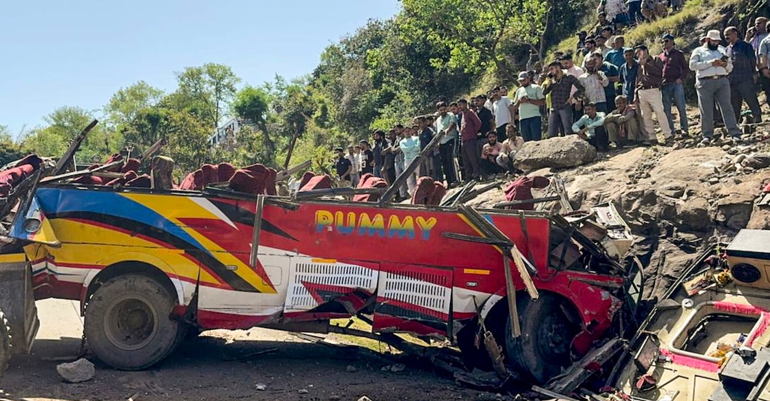 Wrecked remains of a passenger bus after it rolled down a hill, in Jammu and Kashmir's Udhampur district. Photo: PTI.