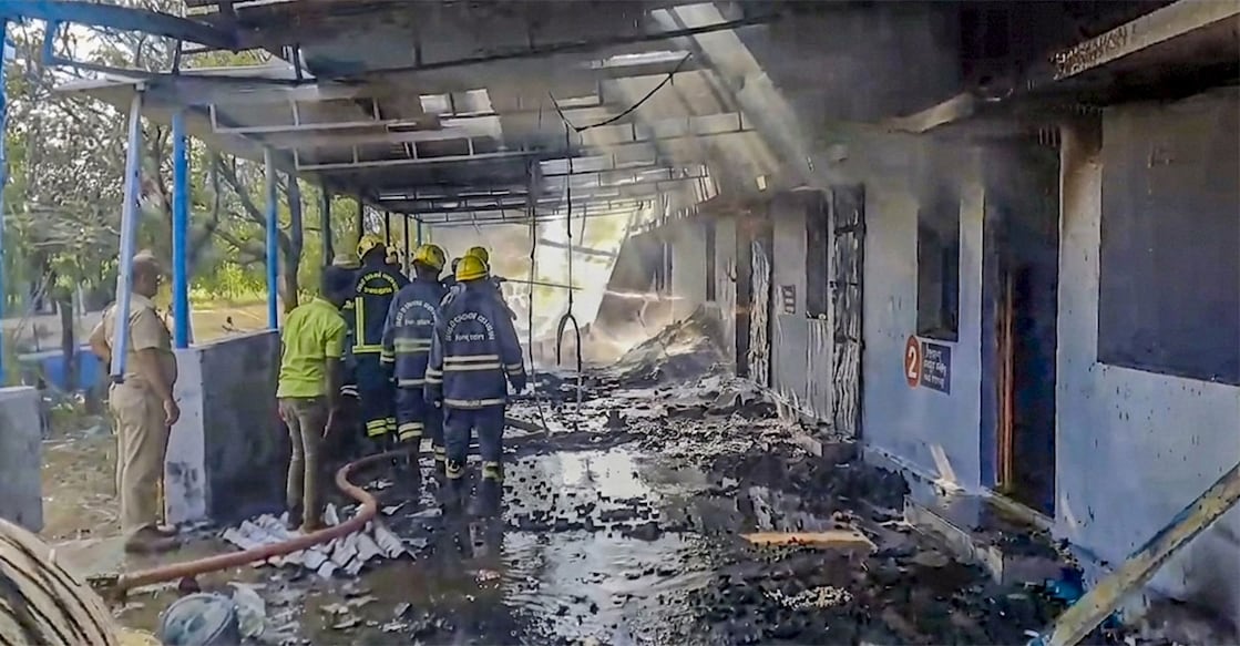 Firefighters at the site after a blast in a firecracker manufacturing unit, at Kattanarpatti in Virudhunagar, Tamil Nadu. Photo: PTI