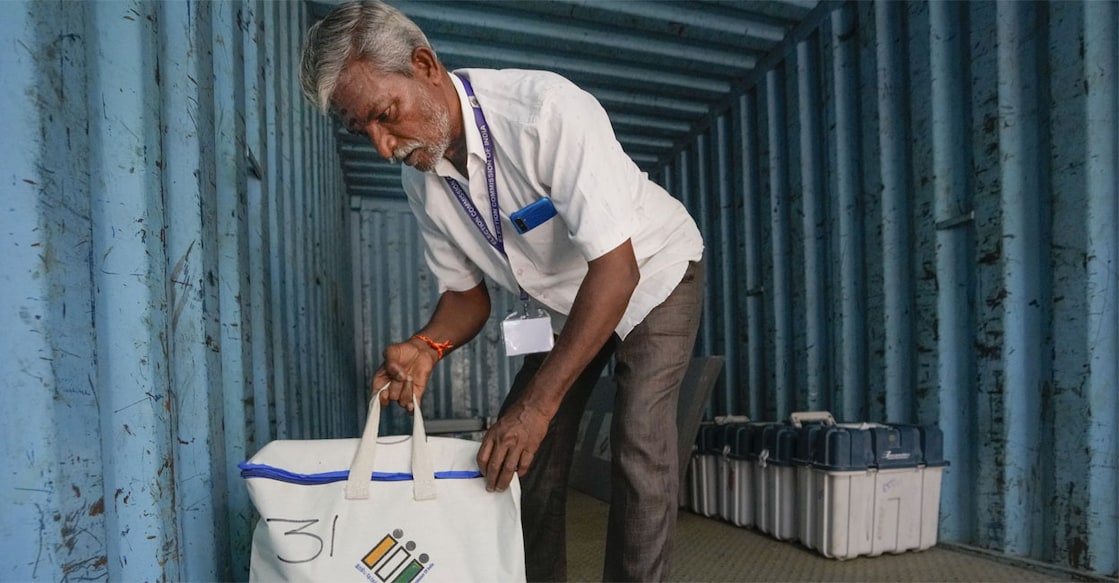 A staff member checks polling materials on the eve of voting in the Tamil Nadu elections. Photo: PTI