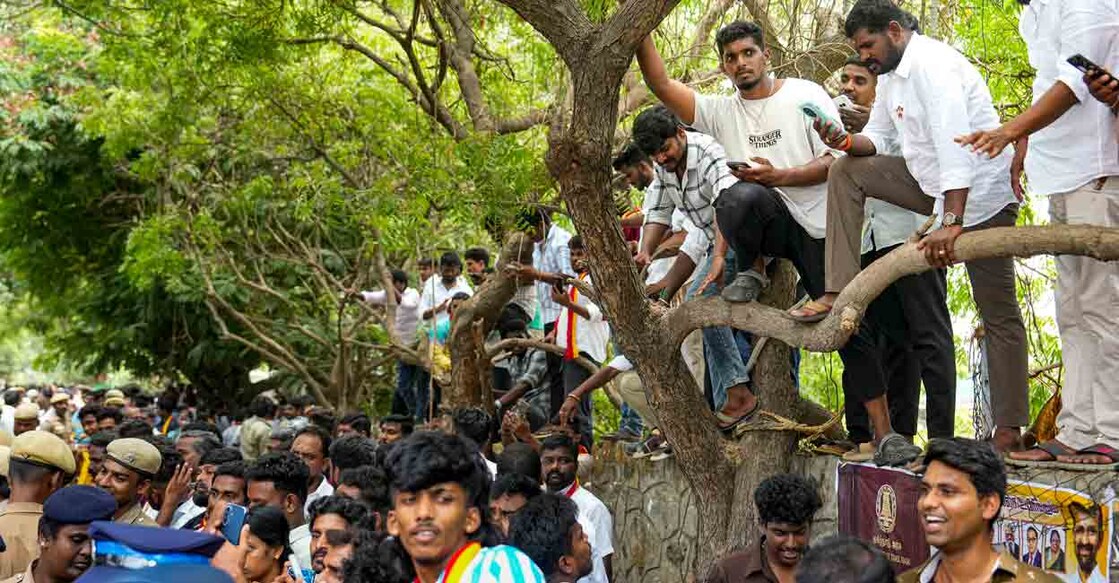 People gather outside Tamilaga Vettri Kazhagam (TVK) headquarters after the party wins the Tamil Nadu Assembly elections, at Panaiyur, in Chennai, Tuesday, May 05, 2026. Photo: PTI