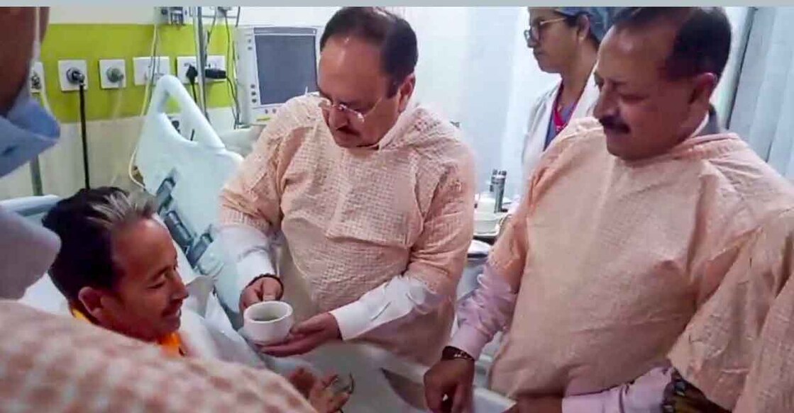 Union Health Minister JP Nadda offers a drink to social activist and educator Sonam Wangchuk as Union Minister of State Jitendra Singh looks on during the breaking of Wangchuk's 26-day indefinite hunger strike, at Medanta Hospital, in Gurugram. Photo: PTI