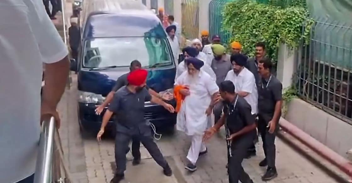 Akali Dal chief and former Punjab deputy chief minister Sukhbir Singh Badal is seen walking inside a building with a cloth wrapped around his right hand after he was attacked near a gurudwara in Nanded district, Maharashtra, on Thursday. Photo: PTI. 
