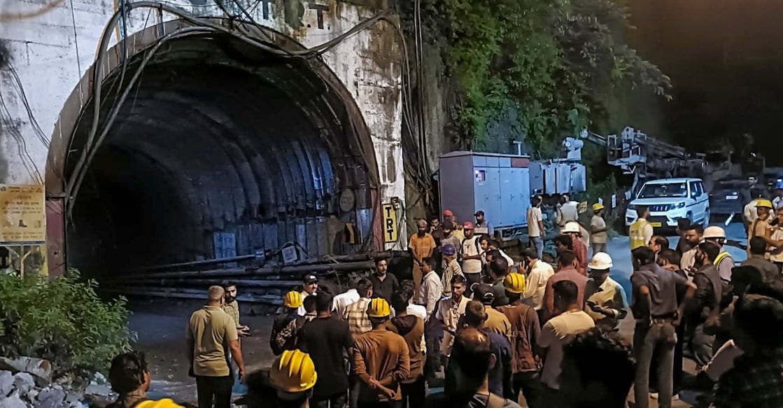 People gather after a landslide in an under-construction tunnel of the Vishnugad-Pipalkoti Hydroelectric Project, in Chamoli district, Uttarakhand. Photo: PTI