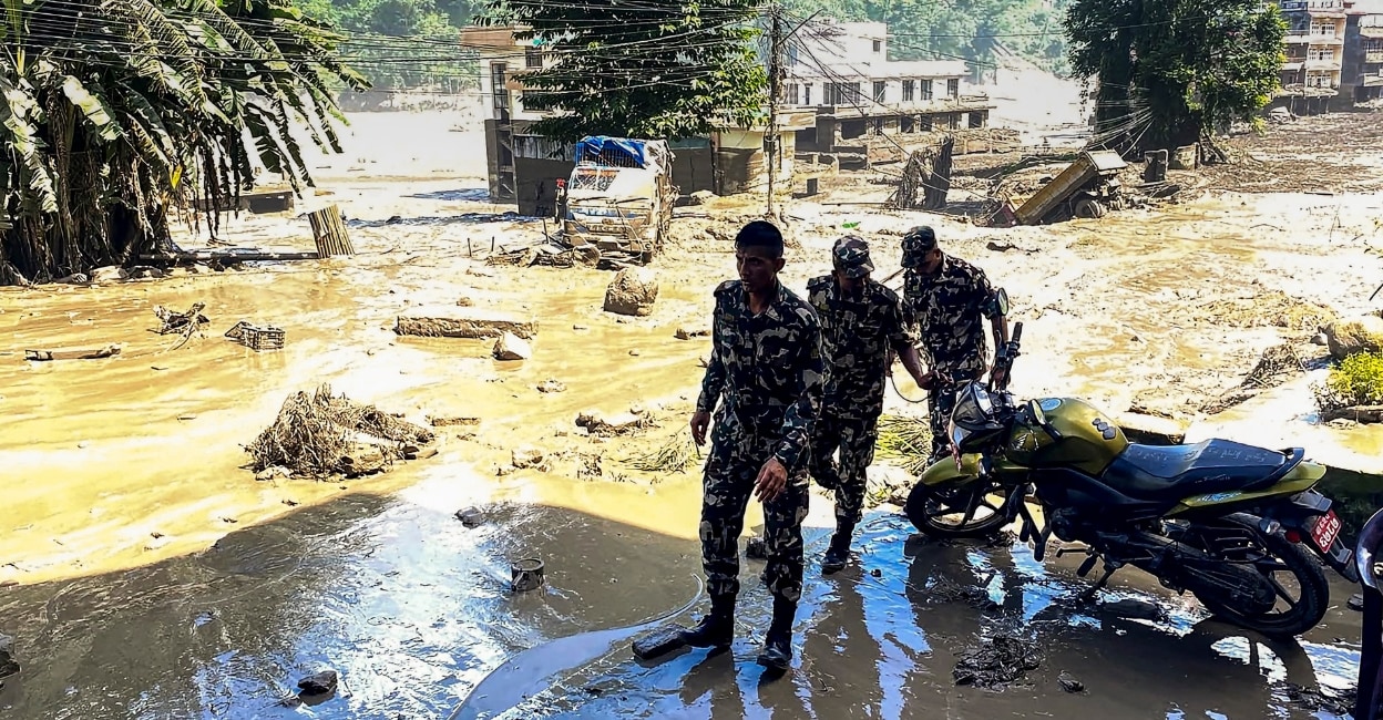 Nepal Army personnel at the flood-affected Beni Ghat area, in Dhading district. Photo: PTI
