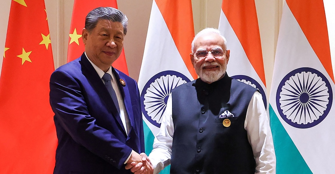 India's Prime Minister Narendra Modi (R) and China's President Xi Jinping shaking hands during a bilateral meeting on the sidelines of the 18th BRICS Summit at New Delhi on September 12, 2026. Photo: AFP/ Indian Press Information Bureau (PIB).