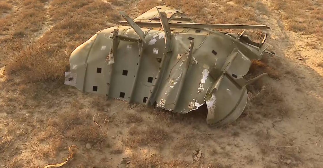 Wreckage lies at the site of the Turkish C-130 military cargo plane crash near the Azerbaijani border, in Sighnaghi municipality, Georgia, November 11, 2025, in this still image taken from video. TV.IMEDI/Handout via REUTERS