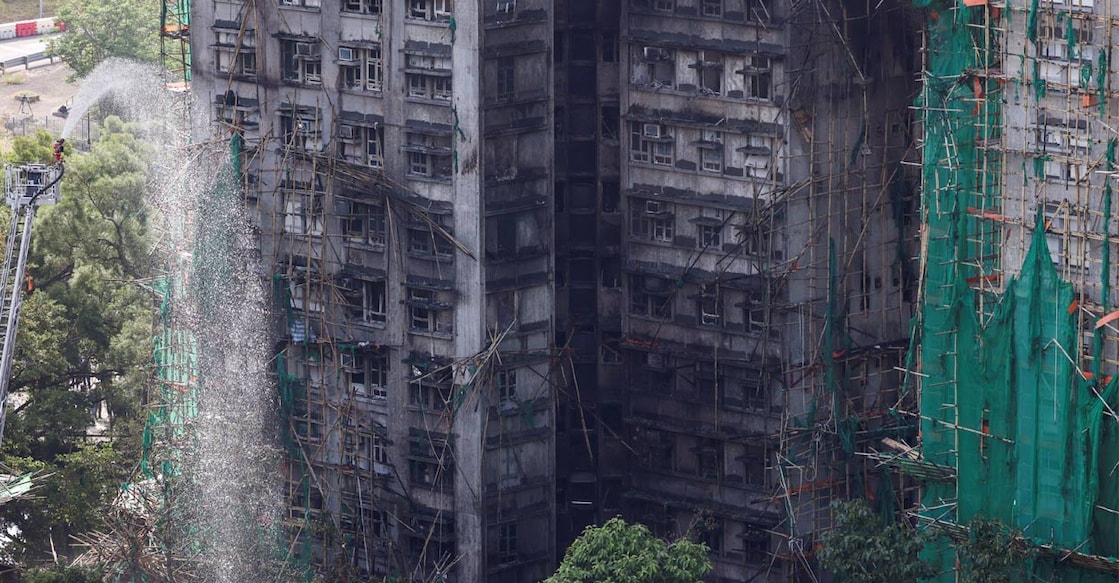 Charred buildings of the Wang Fuk Court complex following a deadly fire. Photo: Reuters. 