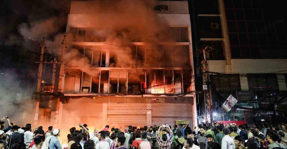 A  group of people set fire to the Prothom Alo newspaper office in Karwan Bazar, following the death of Sharif Osman Hadi, a student leader who had been receiving treatment in Singapore after being shot in the head, in Dhaka, Bangladesh, December 19, 2025. Photo: REUTERS/Mehedi Hasan