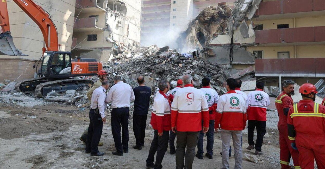 Rescuers work at the site of a damaged building, in the aftermath of Israeli strikes, in Tehran. Photo: REUTERS
