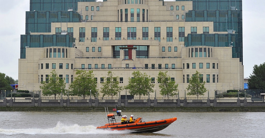 britain-mi6 A motorboat passes by the MI6 building in London August 25, 2010. Photo: REUTERS/Toby Melville