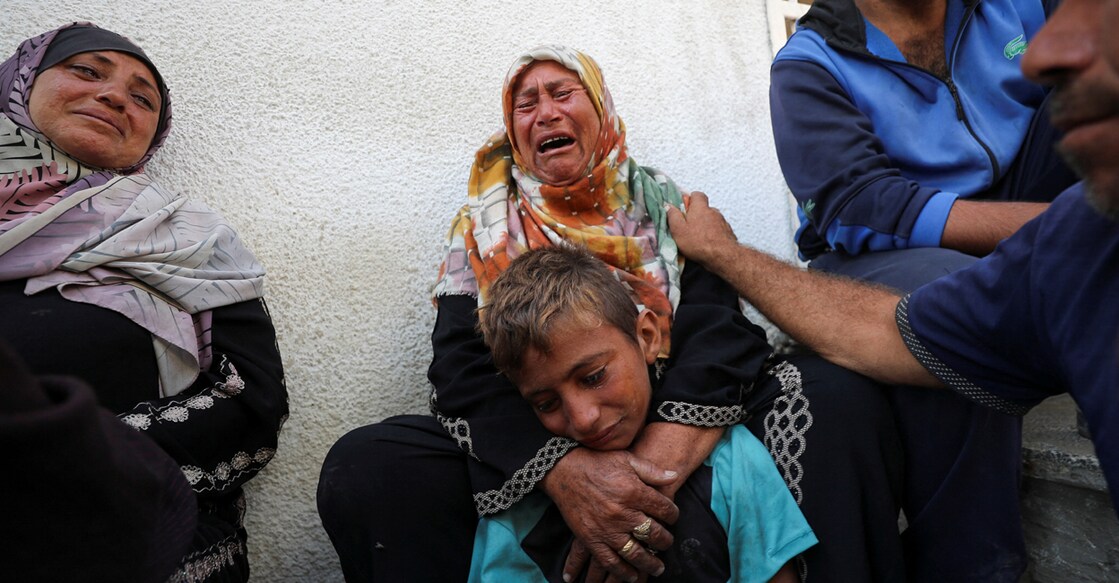 Mourners react during the funeral of Palestinians killed in overnight Israeli strikes. Photo: Reuters