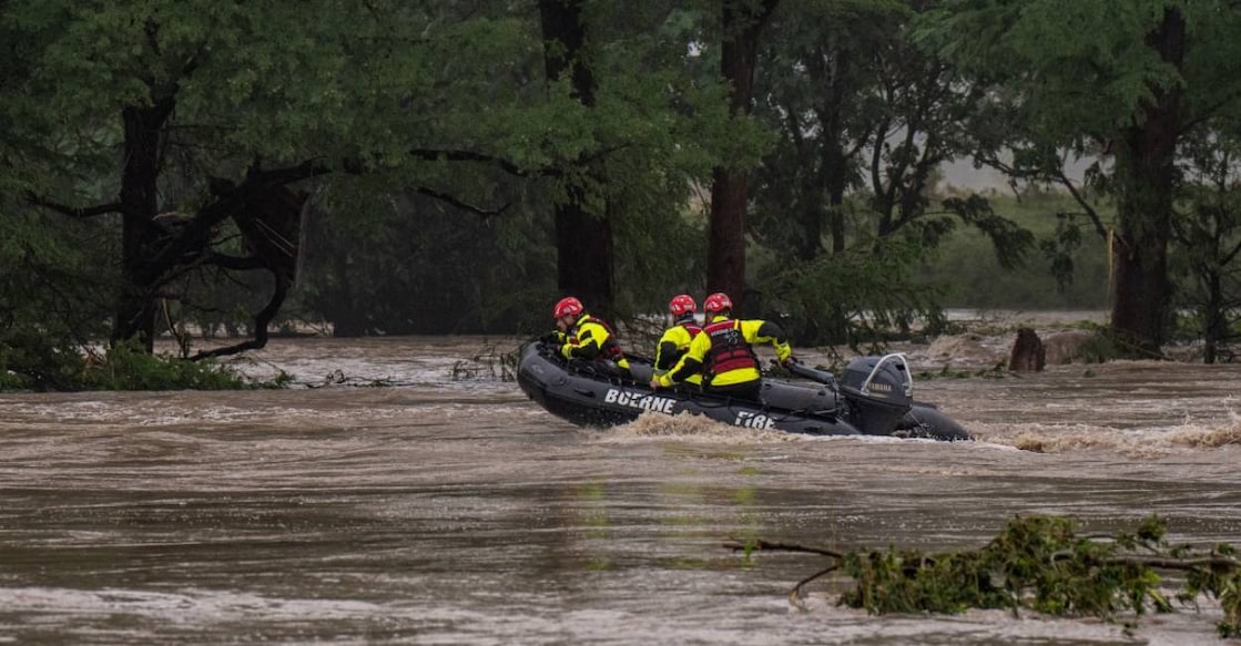 Boerne Search and Rescue teams navigate upstream in an inflatable boat on the flooded Guadalupe River on July 4, 2025 in Comfort, Texas. Photo: AFP