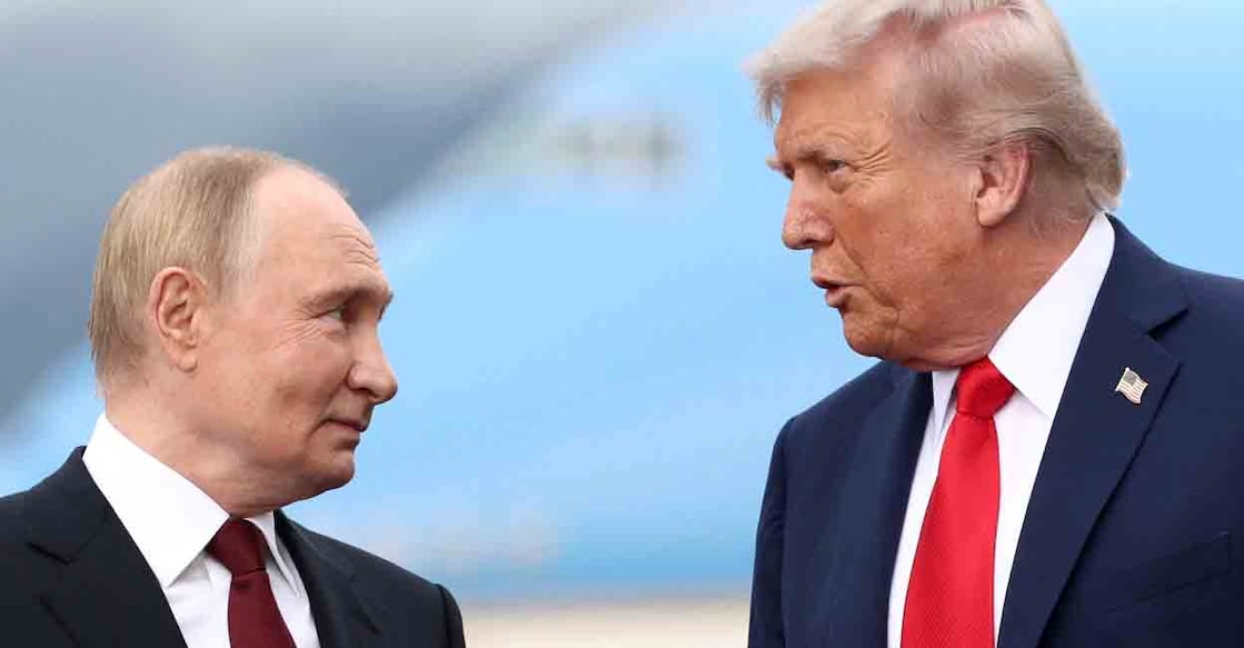 U.S. President Donald Trump speaks with Russian President Vladimir Putin, as they meet to negotiate for an end to the war in Ukraine, at Joint Base Elmendorf-Richardson in Anchorage, Alaska, U.S., August 15, 2025. REUTERS/Kevin Lamarque