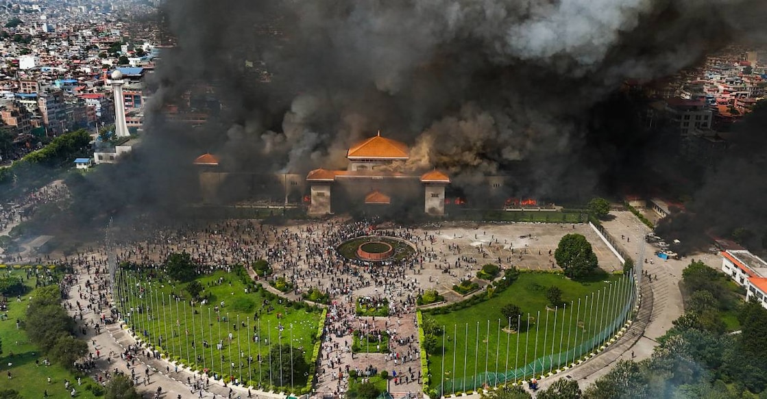 An aerial view of smoke rising from the Federal Parliament of Nepal premises after it was set on fire by protestors during massive anti-government protests, in Kathmandu, Nepal, Tuesday, Sept. 9, 2025. Photo: PTI