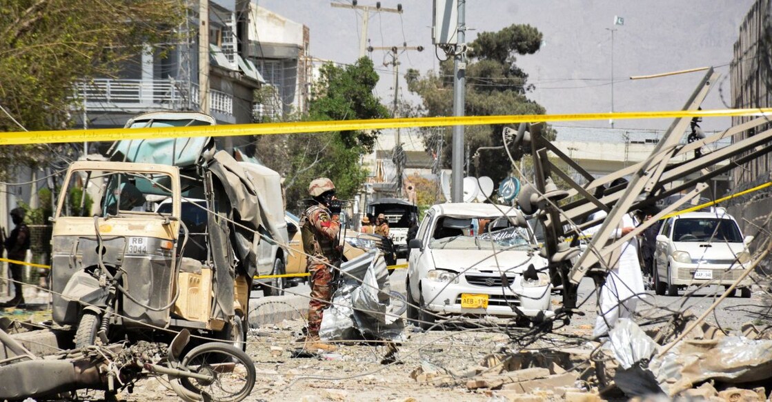 A paramilitary soldier stands amid the debris after a bomb blast near the Frontier Corps headquarters in Quetta, Pakistan. Photo: Reuters