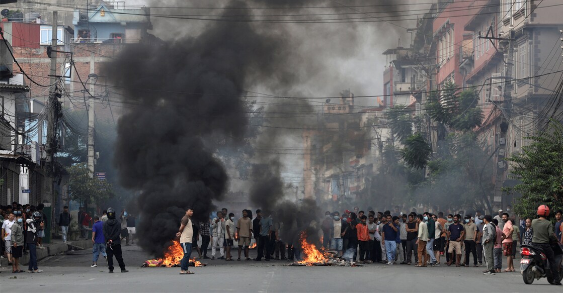 Demonstrators gather to protest against Monday's killing of 19 people after anti-corruption protests that were triggered by a social media ban which was later lifted, during a curfew in Kathmandu. Photo: Reuters