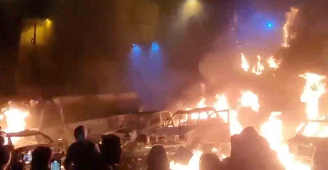 Protesters gather as vehicles burn, amid evolving anti-government unrest, in Tehran, Iran, in this screen grab obtained from a social media video released on January 9, 2026. Photo: Social Media/via REUTERS
