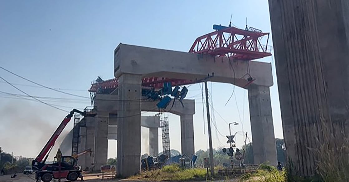 This screen grab made from UGC handout video footage courtesy of Facebook user Smith Mikle taken and released on January 14, 2026 shows the wreckage of a train that crashed after a construction crane collapsed in Thailand's Nakhon Ratchasima province. Photo: AFP