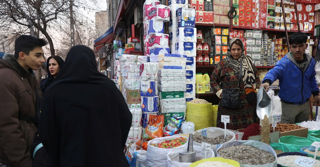 An Iranian woman shops in a local market in Tehran, Iran. Photo: REUTERS/File Photo