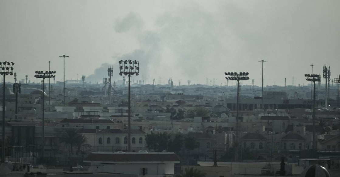 Smoke rises from an area in the direction of Al Udeid Air Base, which houses the Qatar Emiri Air Force and foreign forces including the US, in Doha on February 28, 2026, following a reported Iranian strike. Photo: AFP