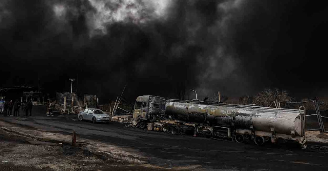 Smoke rises after a reported strike on Shahran fuel tanks in Tehran, Iran, March 8. Photo: Majid Asgaripour/WANA via Reuters