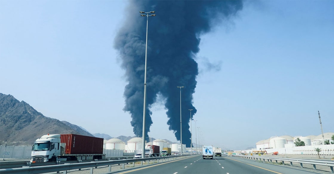 Smoke rises in the Fujairah oil industry zone, caused by debris after interception of a drone by air defences. Photo: REUTERS/Staff